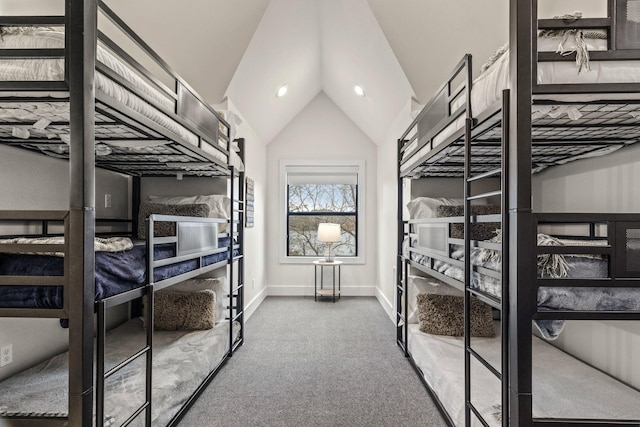 bedroom with carpet flooring and vaulted ceiling