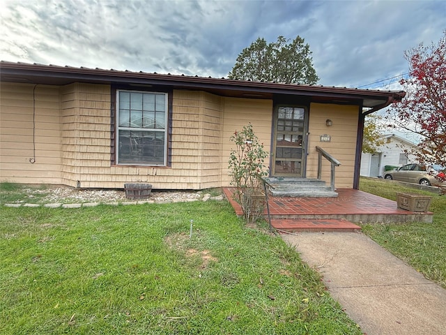 view of front of home with a front yard