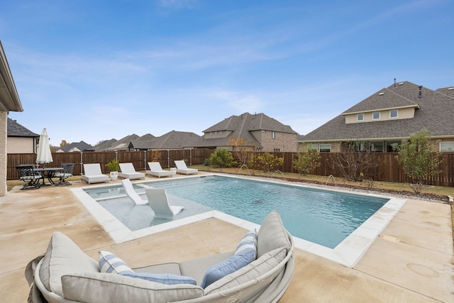 view of pool with a patio