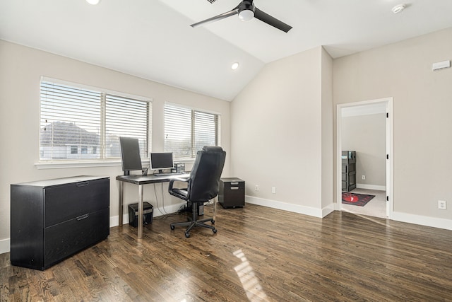 office space with ceiling fan, dark wood-type flooring, and lofted ceiling