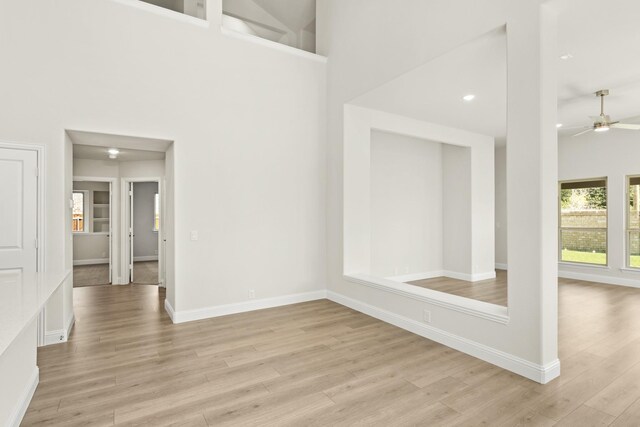 121 Red Cedar Ct, Balch Springs, TX 75181 - entrance foyer with light wood-type flooring, ceiling fan, baseboards, a high ceiling, and recessed lighting