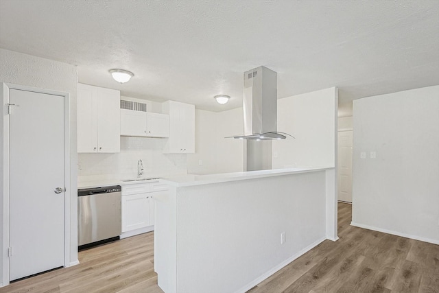 kitchen featuring island range hood, stainless steel dishwasher, white cabinetry, and light hardwood / wood-style floors