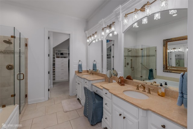 bathroom with an enclosed shower, vanity, tile patterned flooring, and ornamental molding