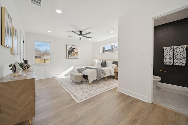 bedroom featuring ceiling fan and light hardwood / wood-style flooring