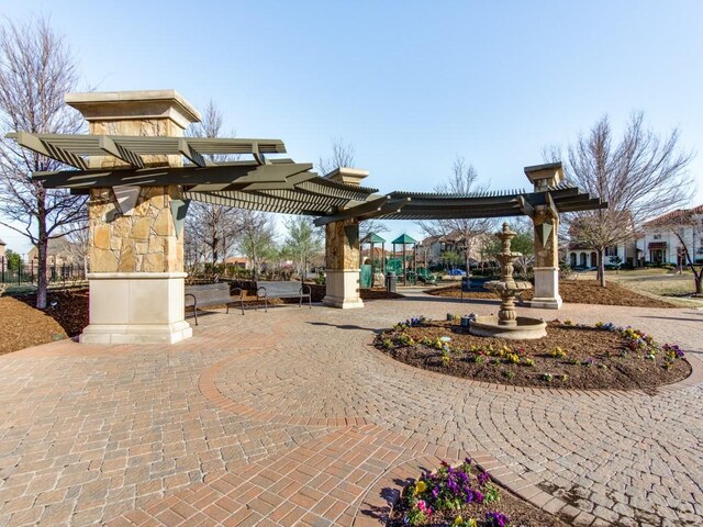 view of property's community featuring a pergola