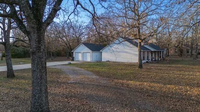 view of property exterior with a garage