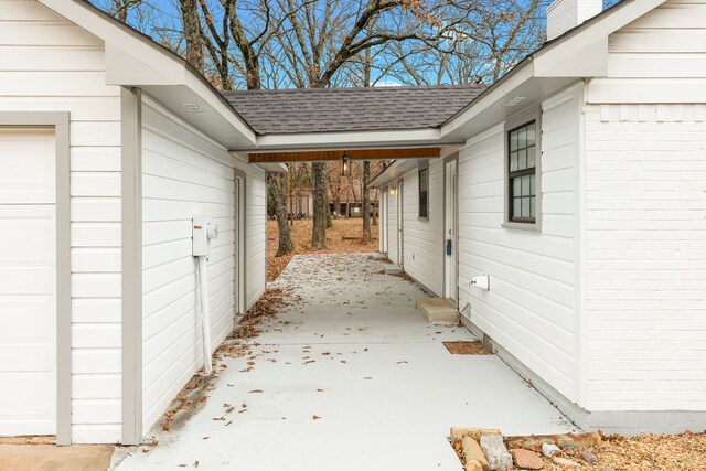 view of property exterior with a garage