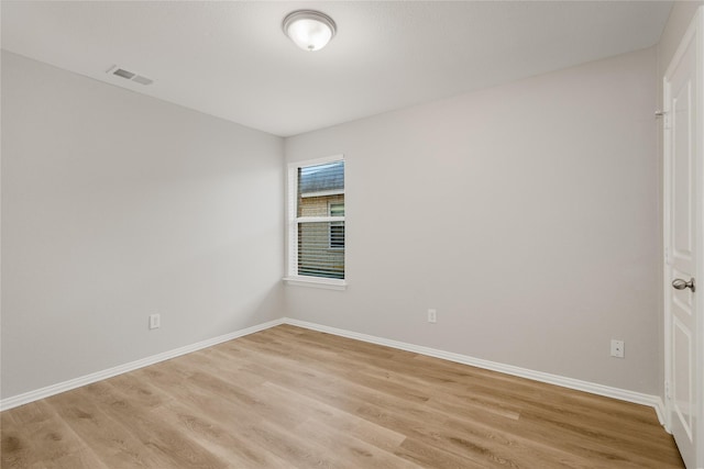 empty room with light wood-type flooring