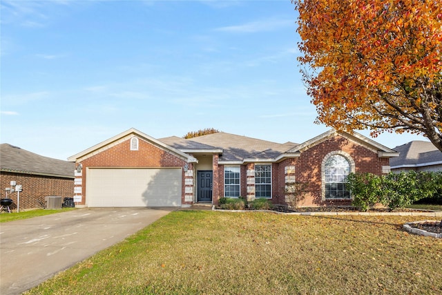 ranch-style house featuring a garage, central AC, and a front yard