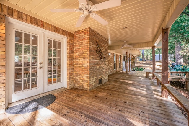 wooden terrace with ceiling fan and french doors