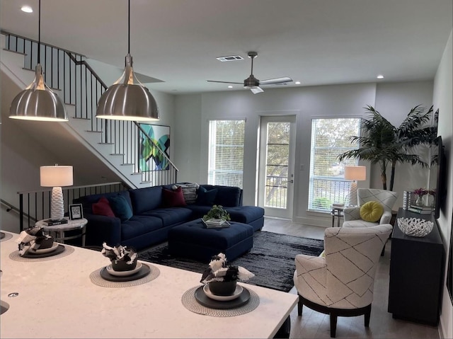 living room featuring ceiling fan