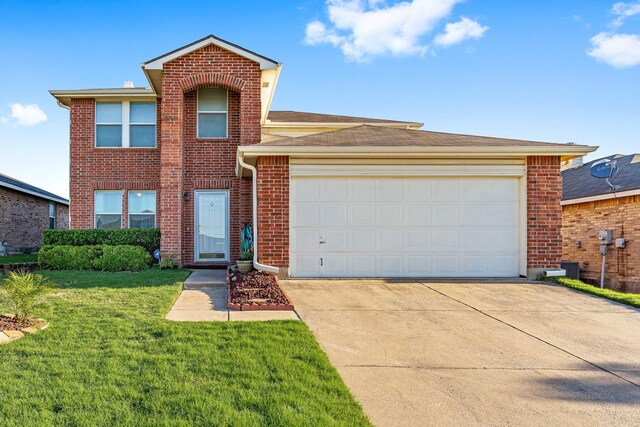 front facade with a garage and a front yard