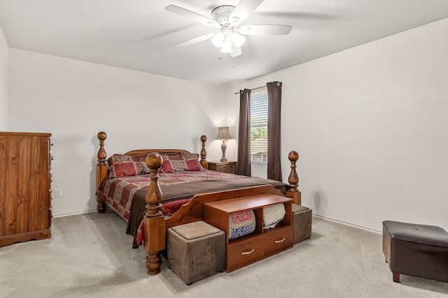 bedroom with light carpet and ceiling fan