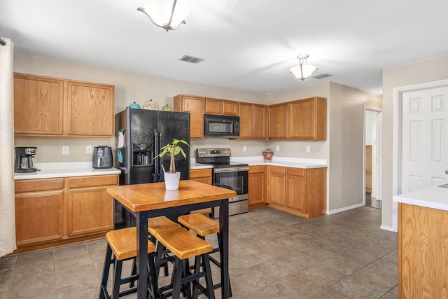 kitchen featuring black appliances