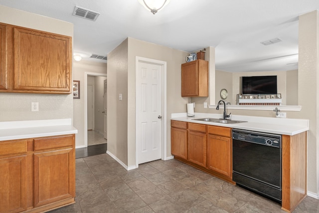 kitchen featuring dishwasher and sink