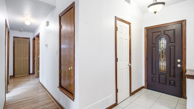 foyer entrance featuring light hardwood / wood-style floors