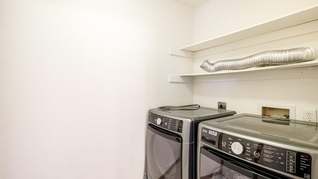 laundry area featuring separate washer and dryer