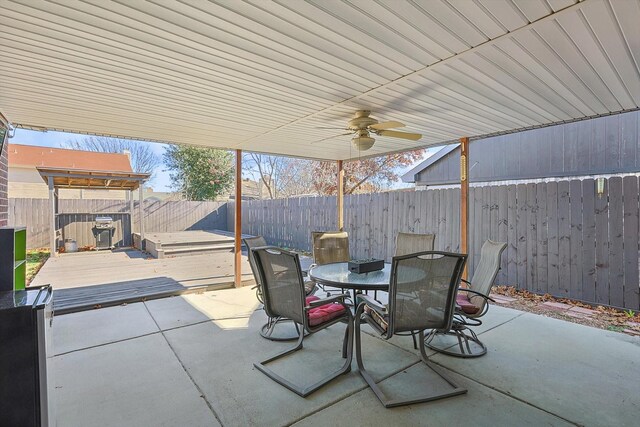 view of patio / terrace with ceiling fan and a wooden deck