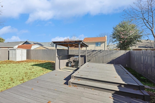 exterior space featuring a wooden deck and a yard