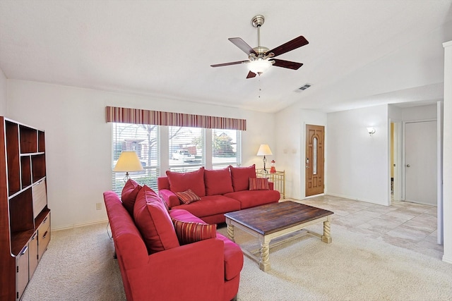 carpeted living room with ceiling fan