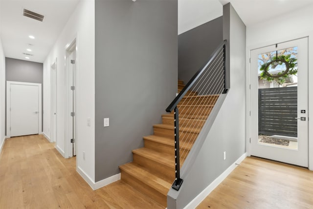 foyer with light hardwood / wood-style flooring