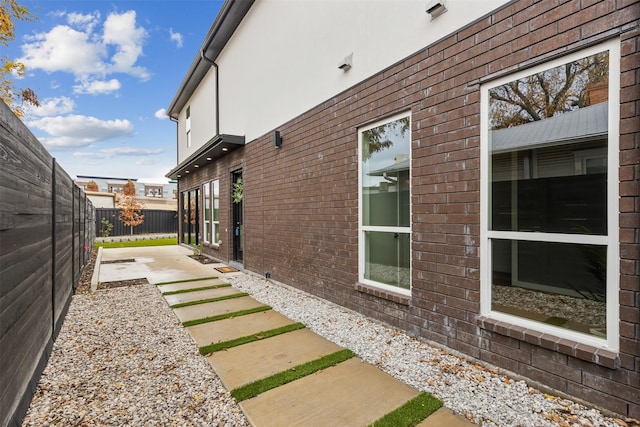 view of home's exterior with a patio