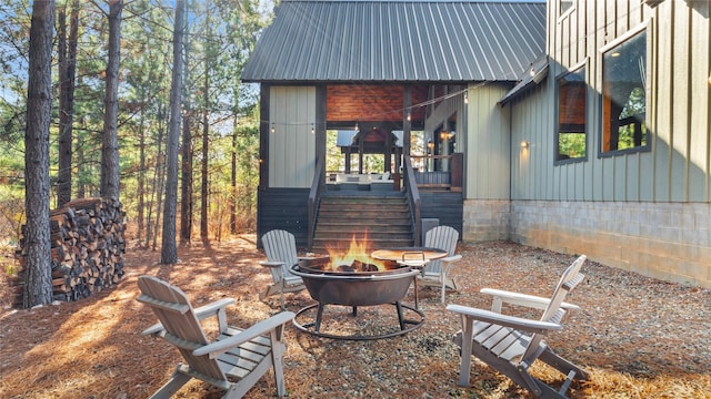 view of patio / terrace with a fire pit