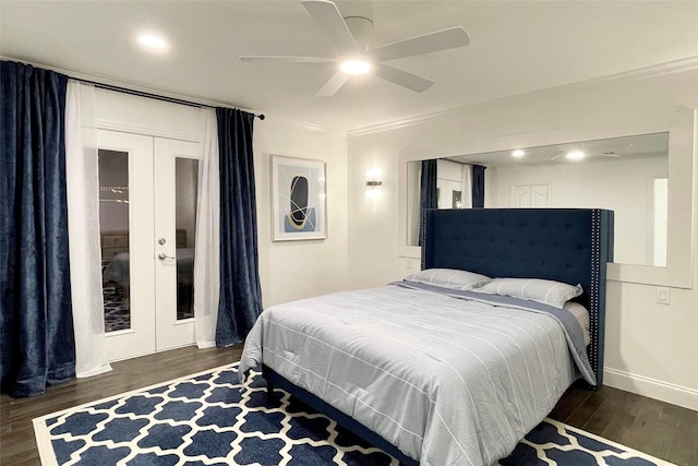 bedroom featuring ceiling fan, dark hardwood / wood-style flooring, crown molding, and french doors