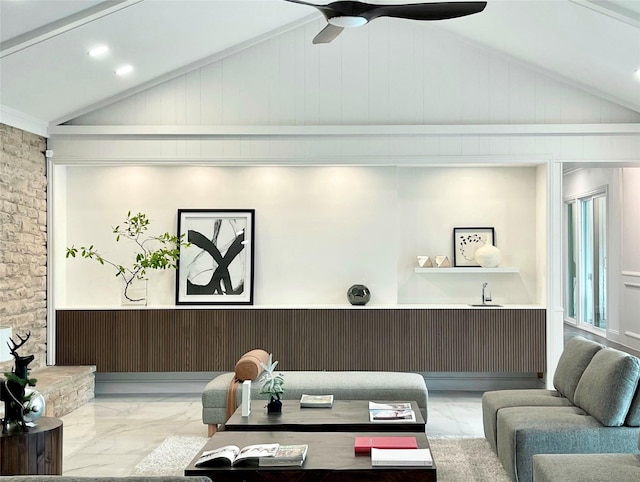 living room featuring wooden walls, ceiling fan, and lofted ceiling