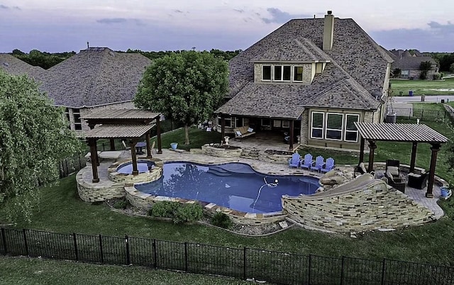 view of swimming pool with a gazebo, a lawn, outdoor lounge area, and a patio