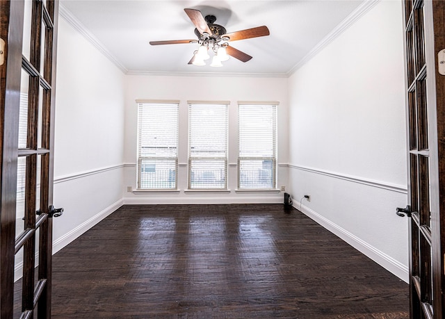 unfurnished room featuring dark hardwood / wood-style flooring, crown molding, french doors, and ceiling fan