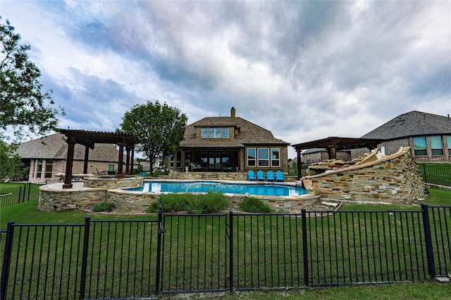 view of swimming pool with a yard and a pergola