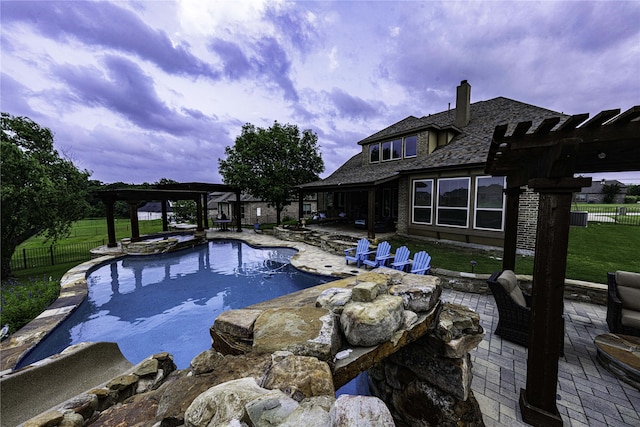 view of pool with a pergola, a patio, and an in ground hot tub