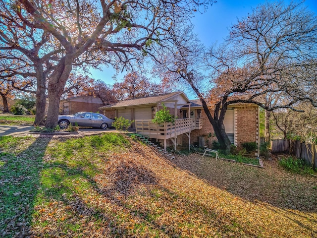 view of front of house with a front lawn and a garage