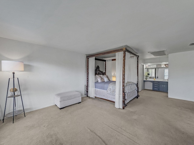 unfurnished bedroom with light colored carpet