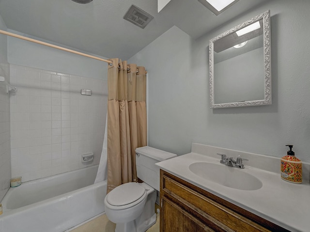 full bathroom with vanity, toilet, and shower / tub combo