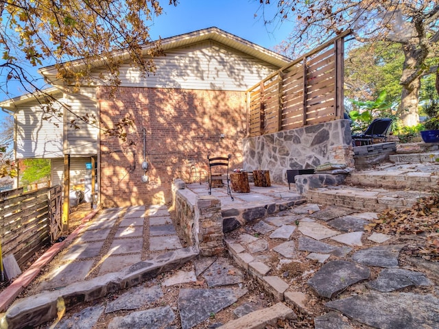 rear view of house with a patio area