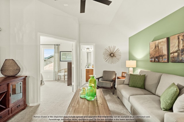 living room featuring light carpet, vaulted ceiling, and ceiling fan