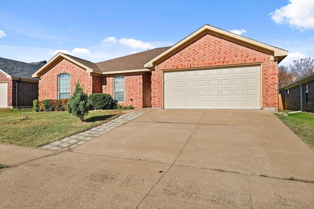 single story home with a garage and a front yard