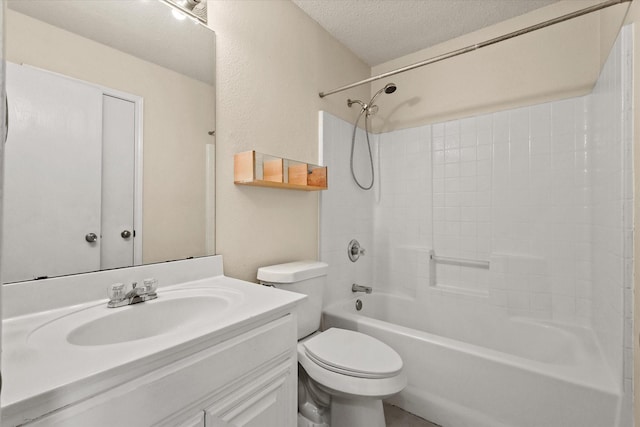 full bathroom with vanity, toilet, bathing tub / shower combination, and a textured ceiling