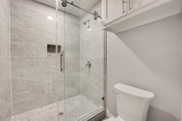 5503 Pecan Grove Dr, Sachse, TX 75048 - full bathroom featuring toilet and a shower stall
