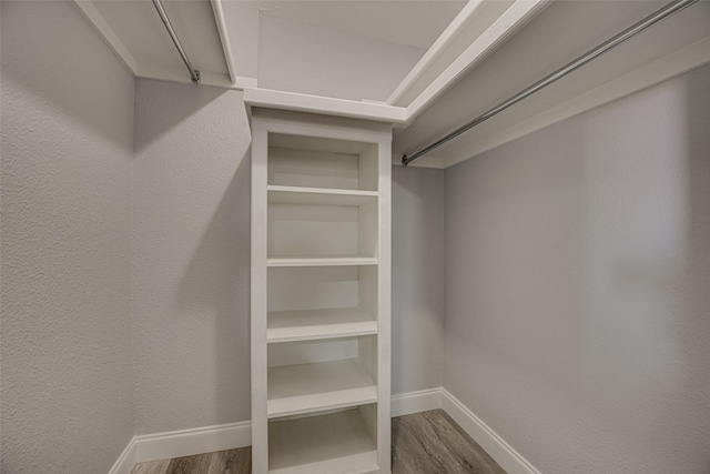 5503 Pecan Grove Dr, Sachse, TX 75048 - walk in closet with wood finished floors