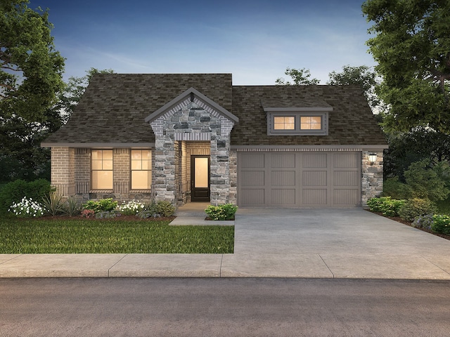 view of front of property with a garage