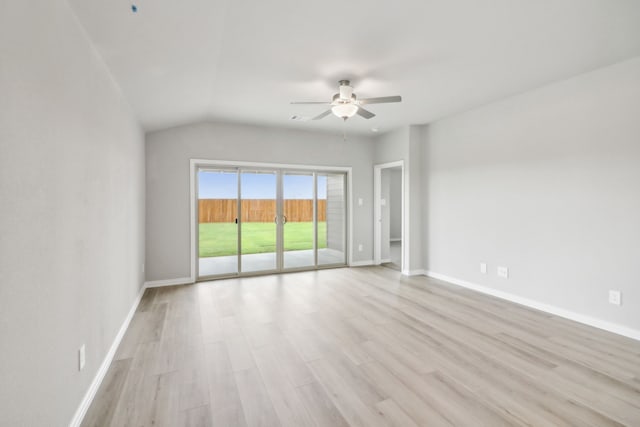 unfurnished room featuring ceiling fan, light hardwood / wood-style flooring, and lofted ceiling