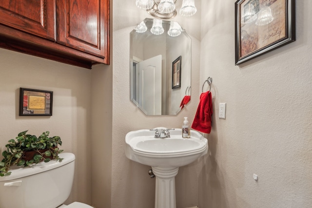 bathroom featuring toilet