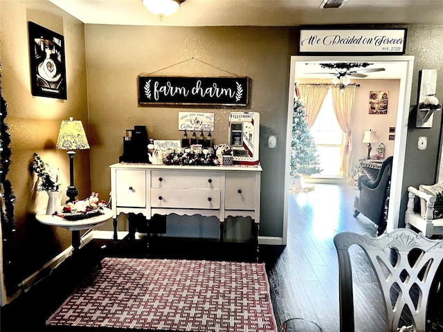 interior space with dark hardwood / wood-style flooring