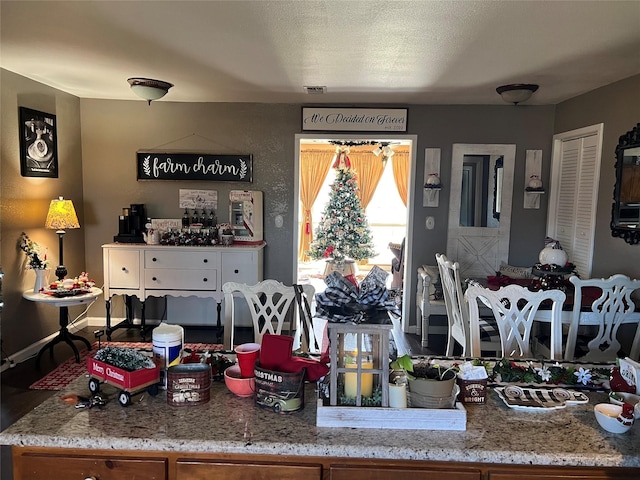 kitchen featuring light stone counters