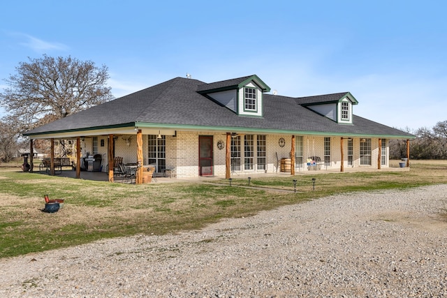 view of front of home featuring a patio