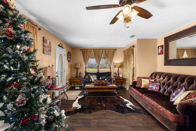 living room with hardwood / wood-style flooring and ceiling fan