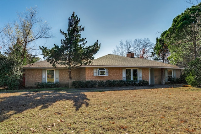 ranch-style house with a front yard